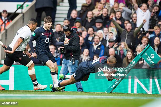 Jonathan Joseph of England dives in to score a try to make the score 5-0 during Old Mutual Wealth Series between England and Fiji played at...