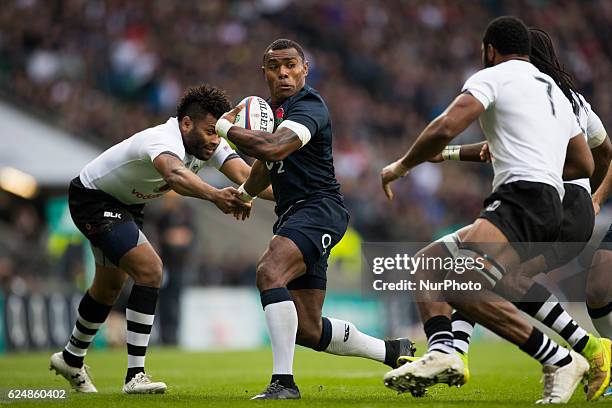 Semesa Rokoduguni of England charges into the Fiji defence during Old Mutual Wealth Series between England and Fiji played at Twickenham Stadium,...