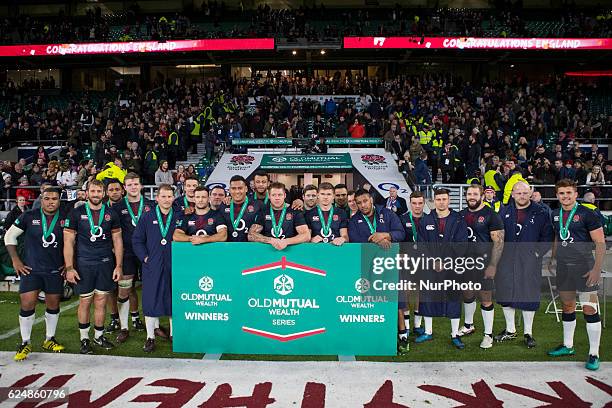The England team with their medals after the Old Mutual Wealth Series between England and Fiji played at Twickenham Stadium, London, November 19th...