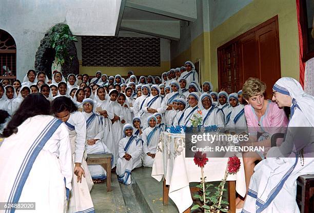 Princess Diana of Wales talks with Mother Teresa's second-in-charge, sister Lynne Frederick during her 45-minute visit to the home of the 81-year-old...