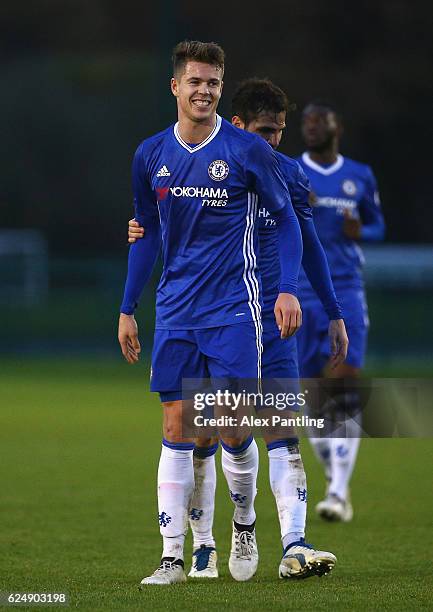 Marco Van Ginkel of Chelsea celebrates with Cesc Fabregas after scoring his sids third goal during the Premier League 2 match between Chelsea and...