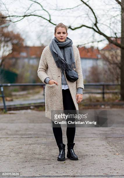 Franziska Engel wearing a creme beige teddy fluffy coat, grey scarf, black bag, black boots, black denim jeans on November 21, 2016 in Berlin,...