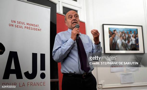 Candidate for the French right-wing presidential primary Alain Juppe delivers a speech at his campaign headquarters following the vote's first round,...