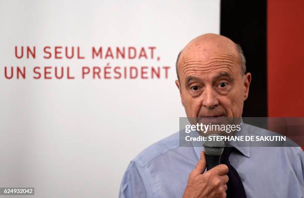 Candidate for the French right-wing presidential primary Alain Juppe delivers a speech at his campaign headquarters following the vote's first round,...