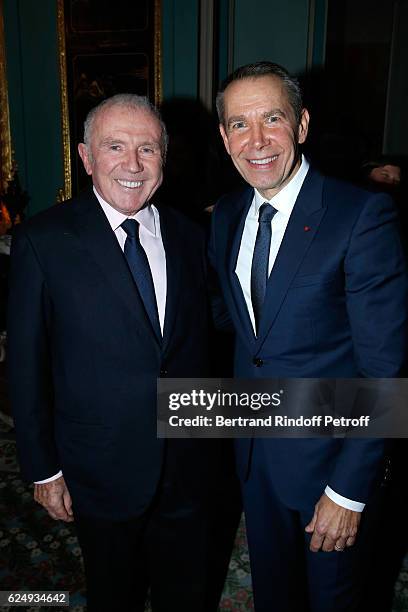 Francois Pinault and Artist Jeff Koons attend the Press conference announcing a donation by artist Jeff Koons who offers the "Bouquet of Tulips" to...