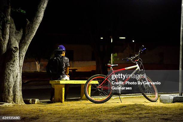 riding a bike - fahrradlampe stock-fotos und bilder