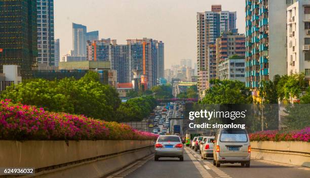 traffic in the city of guangzhou, china - car point of view stock pictures, royalty-free photos & images