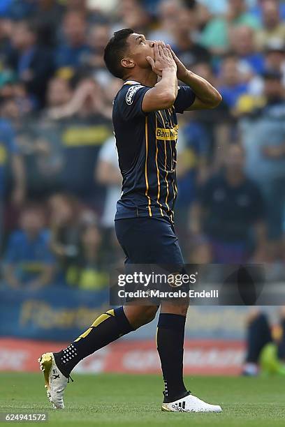 Teofilo Gutierrez of Rosario Central walks off the field after being sent off during a match between Boca Juniors and Rosario Central as part of...