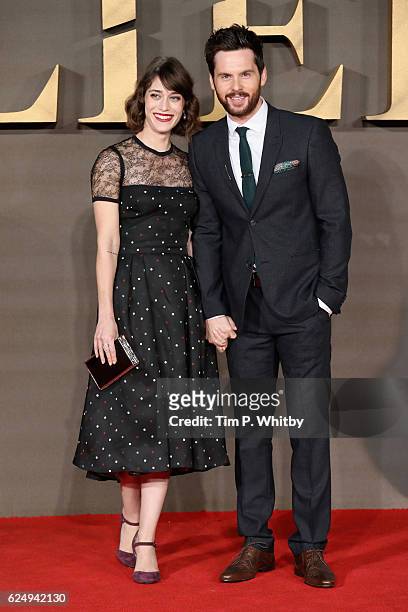 Lizzy Caplan and Tom Riley attend the UK Premiere of "Allied" at Odeon Leicester Square on November 21, 2016 in London, England.