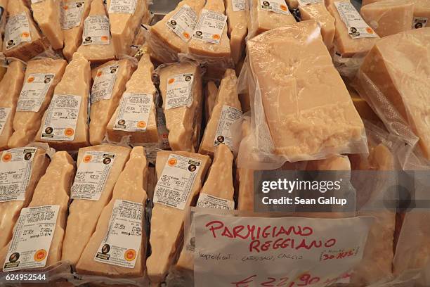 Parmesan cheese lies on display for sale at an outdoor market on October 29, 2016 in Rome, Italy. Rome is among Europe's major tourist destinations.