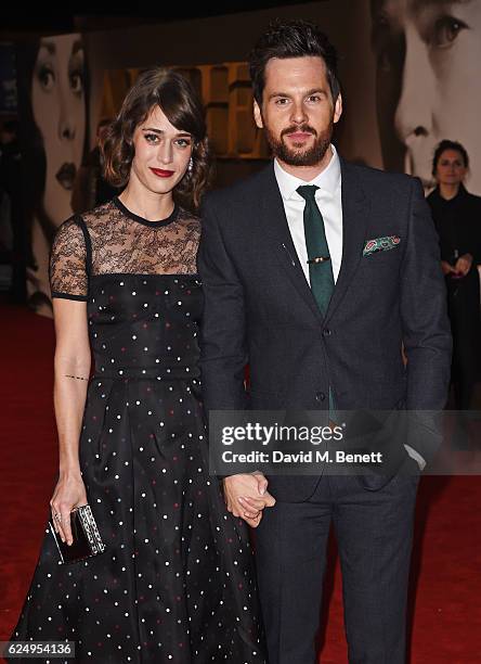 Lizzy Caplan and Tom Riley attend the UK Premiere of "Allied" at Odeon Leicester Square on November 21, 2016 in London, England.