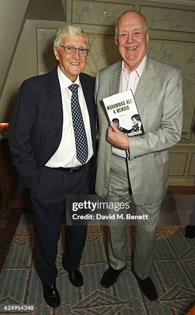 Sir Michael Parkinson and Sir Tim Rice attend the launch of Sir Michael Parkinson's new book "Muhammad Ali: A Memoir" at Fortnum & Mason on November...