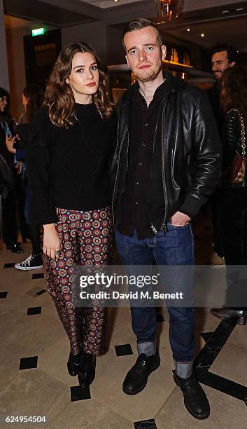 Sai Benett and Sam Doyle attend a live poetry reading event at Thomas's, Burberry's all-day British cafe located on 5 Vigo Street, on November 21,...