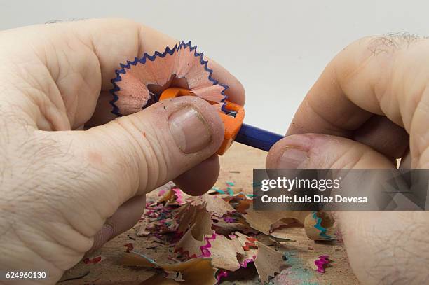 sharpening coloring pencils - shavings stock pictures, royalty-free photos & images