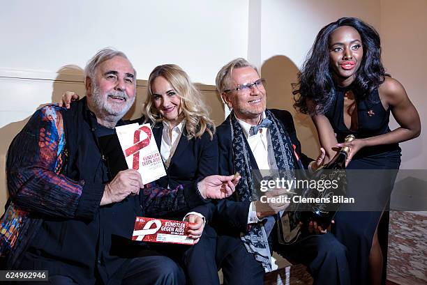 Udo Walz, Katherine Mehrling, Rene Koch and a model attend the Artists Against Aids Gala at Stage Theater des Westens on November 16, 2016 in Berlin,...