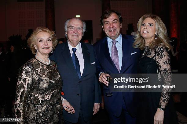 Myriam de Colombie, her husband Jean-Louis Vilgrain, Alexandre Vilgrain and President of Care France, Arielle de Rothschild attend the "Diner des...