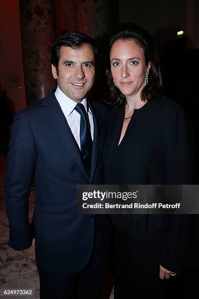 Nicolas Houze and his wife Anne-Charlotte attend the "Diner des amis de Care" for the 70th anniversary of the Association. Held at Espace Cambon on...