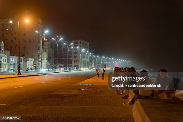 havana night at the malecon - havana nights stock pictures, royalty-free photos & images