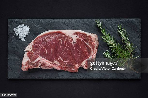 rib eye steak - rib eye steak stock-fotos und bilder