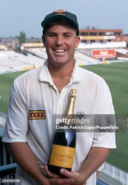 Shane Warne of Australia with his Man of the Match award after the 1st Test match between England and Australia at Old Trafford, Manchester, 7th June...