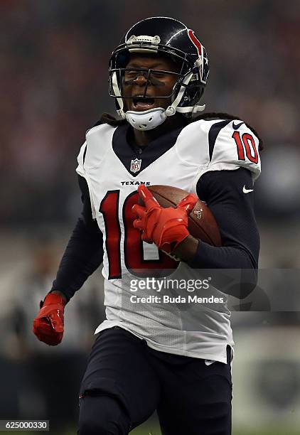 DeAndre Hopkins of the Houston Texans runs after catching a pass against the Oakland Raiders at Estadio Azteca on November 21, 2016 in Mexico City,...