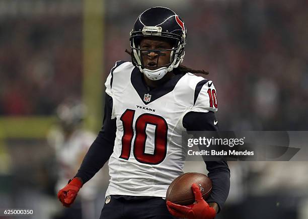 DeAndre Hopkins of the Houston Texans runs after catching a pass against the Oakland Raiders at Estadio Azteca on November 21, 2016 in Mexico City,...