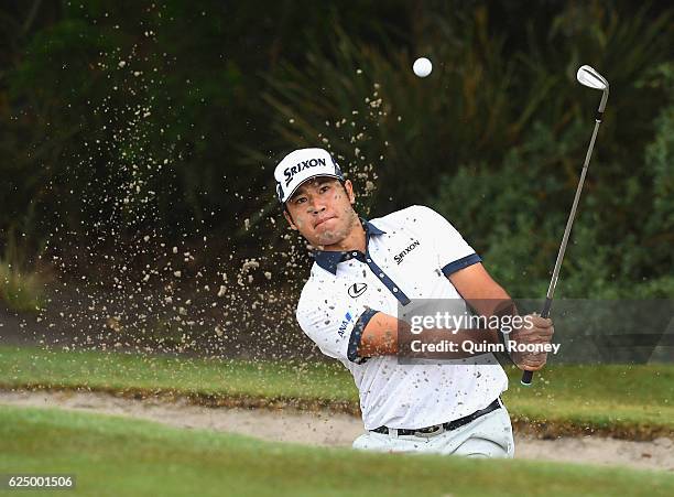 Hideki Matsuyama of Japan practises out of the bunker ahead of the 2016 World Cup of Golf at Kingston Heath Golf Club on November 22, 2016 in...