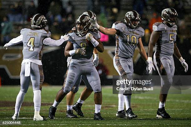 Caleb Bailey of the Western Michigan Broncos recovers a fumble in the third quarter against the Buffalo Bulls at Waldo Field on November 19, 2016 in...