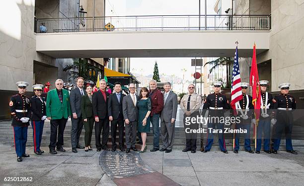 Marines representing Toys For Tots Foundation, Parade Producers William Lomas and Jim Romanovich, VP Public Relations, Author Services Inc. Emily...
