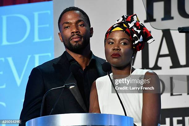 Actor Tobias Truvillion and singer V. Bozeman speak onstage during the Thurgood Marshall College Fund 28th Annual Awards Gala at Washington Hilton on...