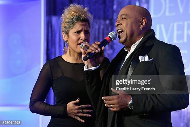 Jaymee Rodriguez and Peabo Bryson perform onstage during the Thurgood Marshall College Fund 28th Annual Awards Gala at Washington Hilton on November...