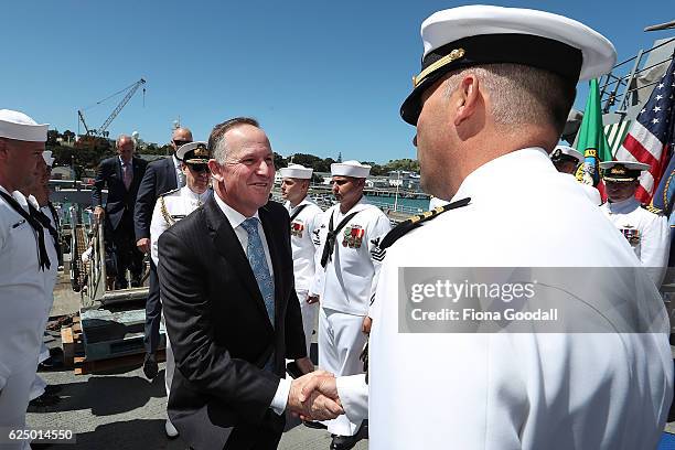 New Zealand Prime Minister John Key boards the USS Sampson and meets the ship's Captain, Commander Tim LaBenz at Devonport Naval Base on November 22,...