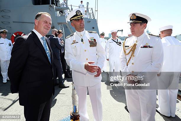 New Zealand Prime Minister John Key on board the USS Sampson with the ship Captain, Commander Tim LaBenz and RNZN Chief of Navy Rear Admiral John...