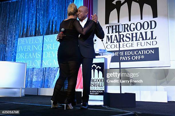 Jaymee Rodriguez and Peabo Bryson perform onstage during the Thurgood Marshall College Fund 28th Annual Awards Gala at Washington Hilton on November...