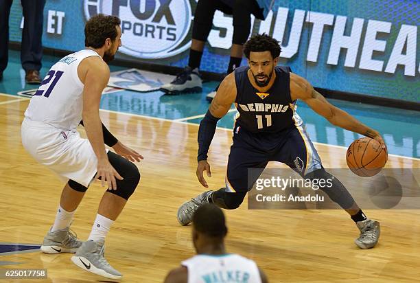 Marco Belinelli of Charlotte Hornets blocks Mike Conley of Memphis Grizzlies during the NBA match between Memphis Grizzlies vs Charlotte Hornets at...