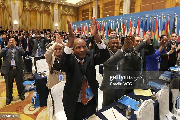 Guests do exercise during meetings break of the 9th Global Conference on Health Promotion at Shanghai International Convention Center on November 21,...