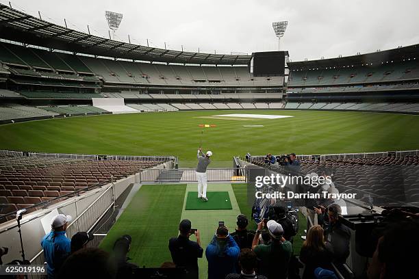 Jaco Van Zyl of South Africa hits a ball from the stands of the M.C.G. At a taget on the field ahead of the 2016 World Cup of Golf at Kingston Heath...