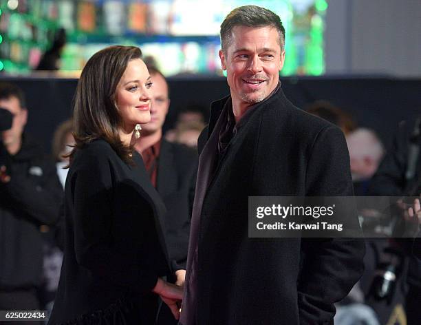 Brad Pitt and Marion Cotillard attend the UK Premiere of "Allied" at Odeon Leicester Square on November 21, 2016 in London, England.