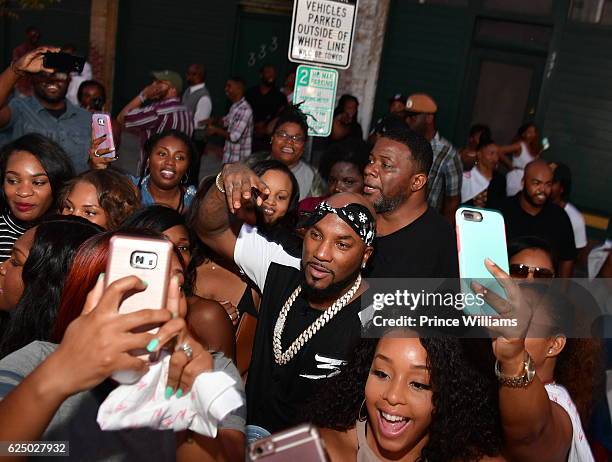 Young Jeezy poses With Fans at His secret show at the Music Room on October 29, 2016 in Atlanta, Georgia.