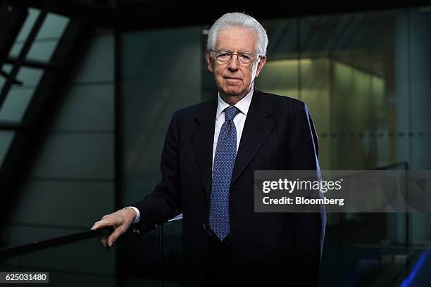 Mario Monti, Italy's former prime minister, poses for a photograph following a Bloomberg Television interview in London, U.K., on Tuesday, Nov. 22,...