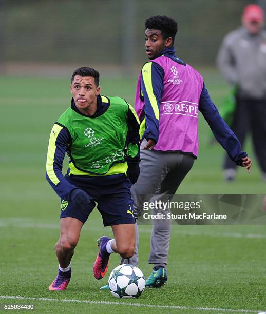 Alexis Sanchez and Gedion Zelalem of Arsenal during a training session at London Colney on November 22, 2016 in St Albans, England.