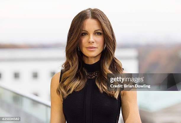 Actress Kate Beckinsale attends the Berlin to photocall for 'Underworld: Blood Wars' wearing a dress by Elie Saab on the terrace at Akademie der...