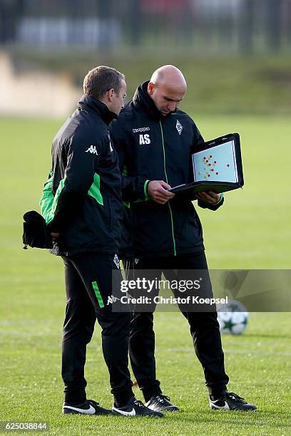 Assistnt coach Frank Geideck and head coach Andre Schubert attend taining session ahead of the UEFA Champions League match between Borussia...