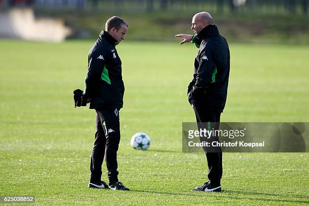 Assistnt coach Frank Geideck and head coach Andre Schubert attend taining session ahead of the UEFA Champions League match between Borussia...
