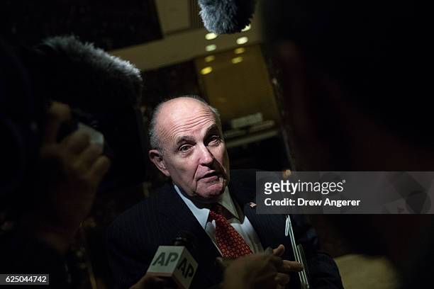 Former New York City mayor Rudy Giuliani speaks to reporters as he leaves Trump Tower, November 22, 2016 in New York City. President-elect Donald...
