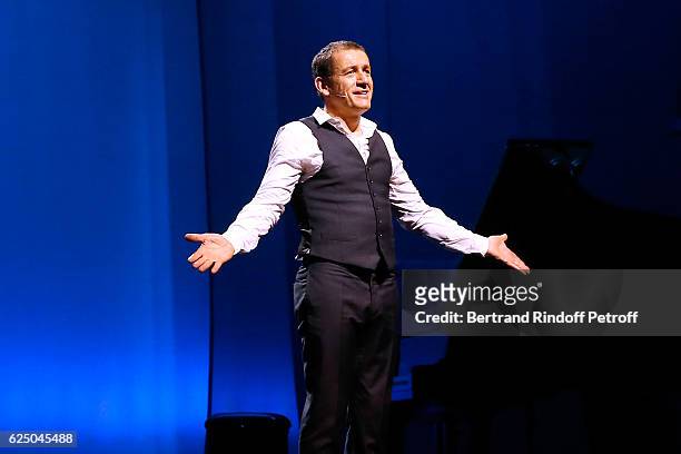 Humorist Dany Boon acknowledges the applause of the audience at the end of his "Dany De Boon Des Hauts-De-France" Show at L'Olympia on November 20,...