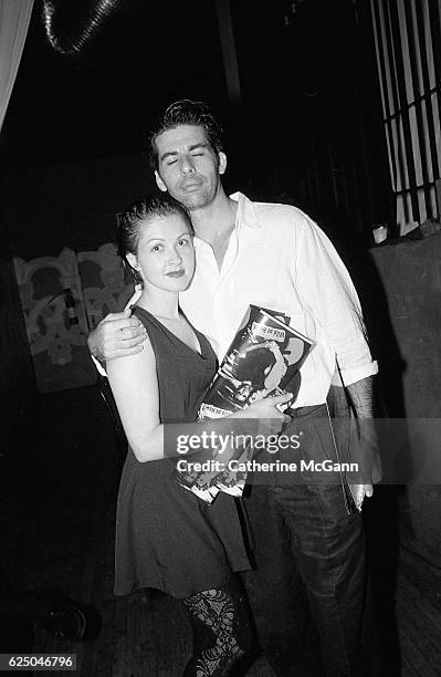 Cyndi Lauper and friend pose for a photo at a party for the premier of David Lynch's film "Wild at Heart" on August 9th, 1990 in New York City, New...