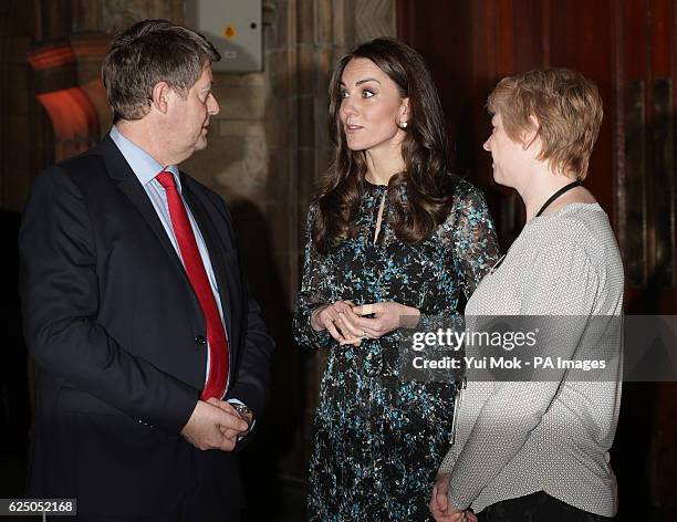 The Duchess of Cambridge speaks with Head of National Public Programmes Katrina Nilsson and Museum Director Sir Michael Dixon , as she attends a...