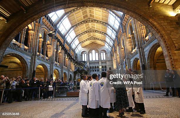 Catherine, Duchess of Cambridge with pupils from Oakington Manor Primary School, Wembley, in front of Dippy the Diplodocus, as she attends a...