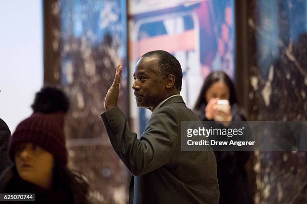 Former Republican presidential hopeful Ben Carson waves as he leaves Trump Tower, November 22, 2016 in New York City. President-elect Donald Trump...